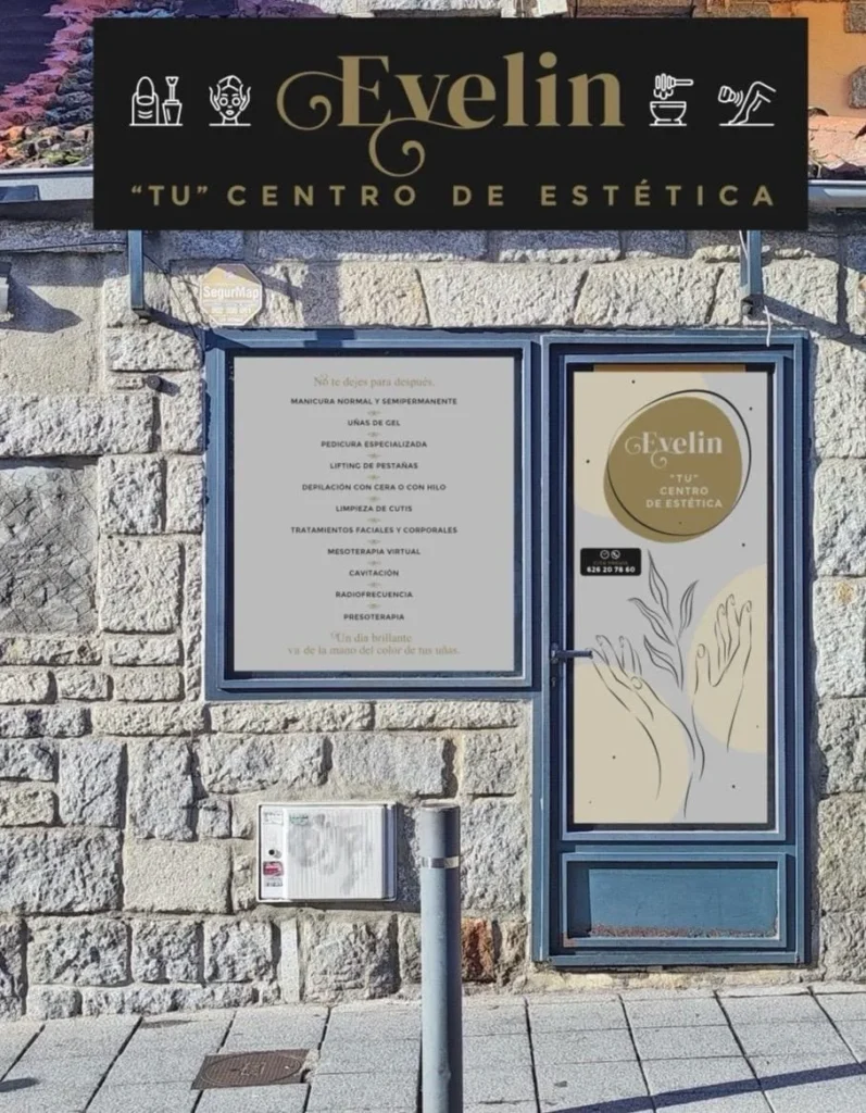 Exterior del Centro Estetico Evelin, ventana y puerta con muro de piedras